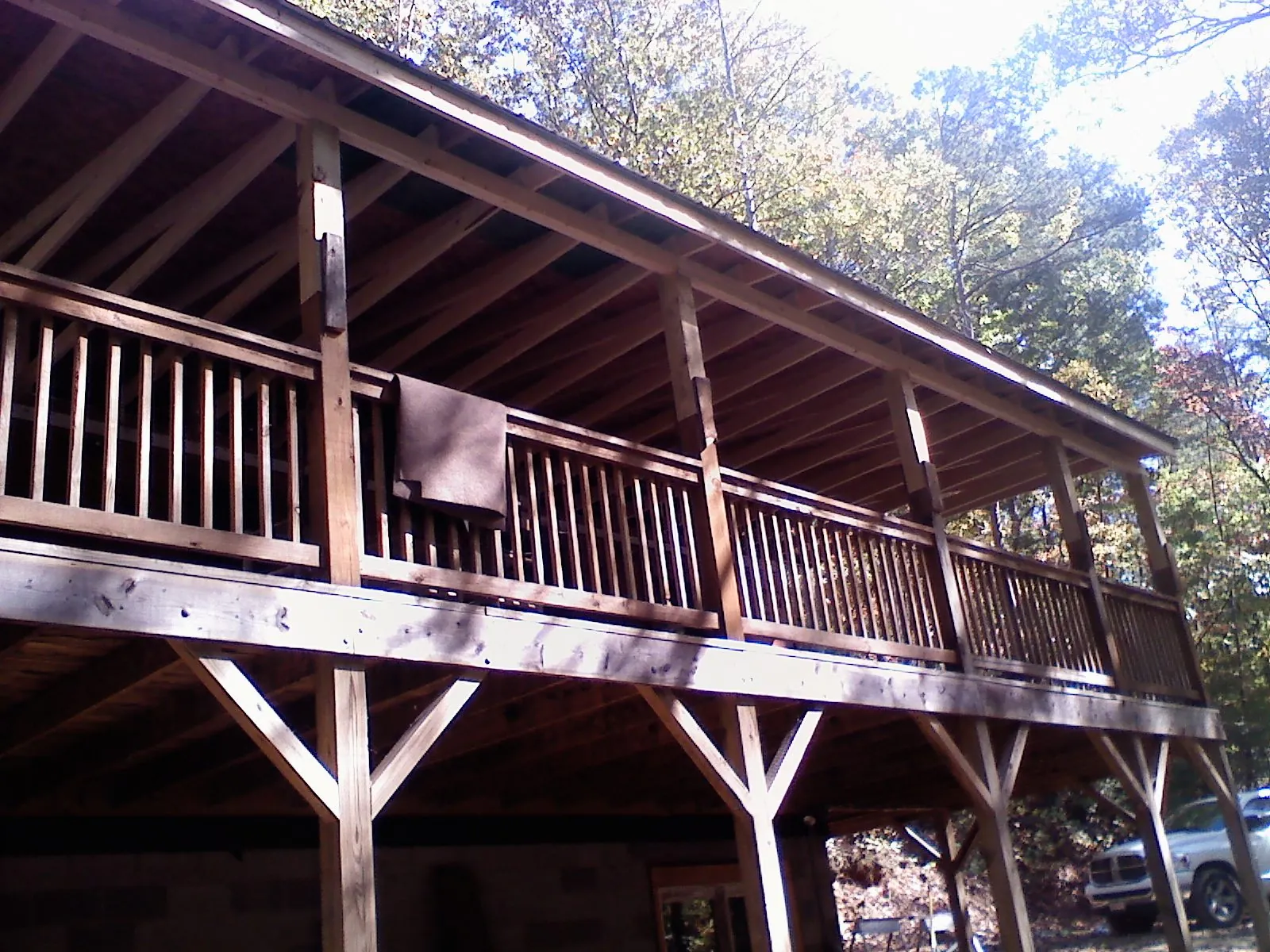 Timber framing under a new elevated porch and deck — Roof Leak Repair in Llano by Roofing Brothers